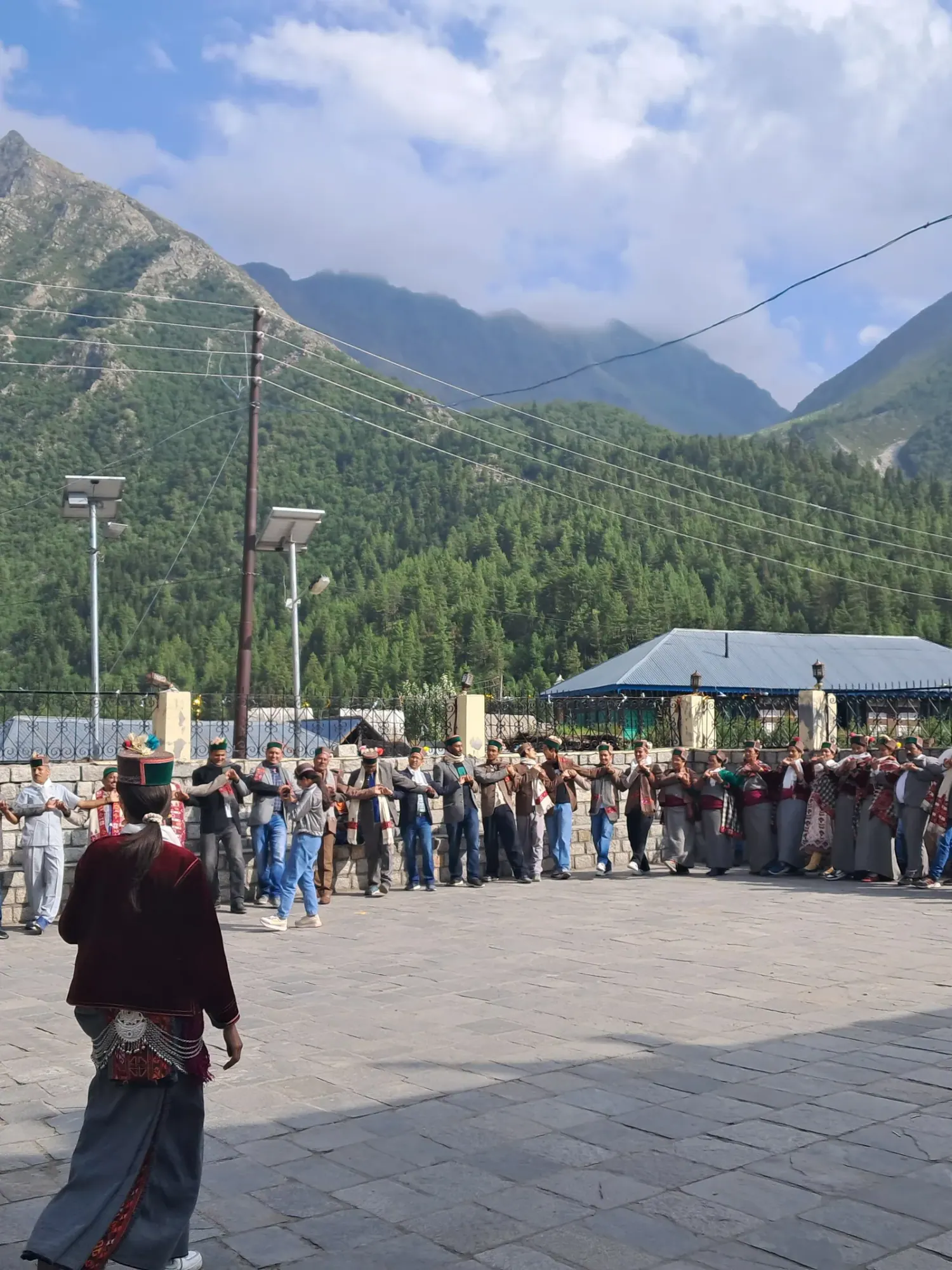 Villagers of Chitkul performing a Kinnauri dance in traditional dress